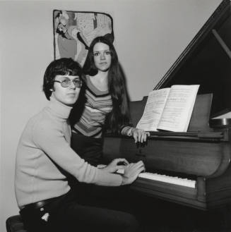 Man And Woman At A Piano