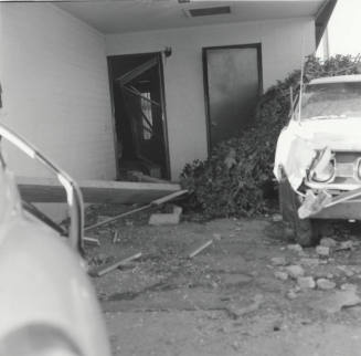 White Car and Destroyed Carport