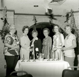 Unidentified Group of Women Around Candled Table