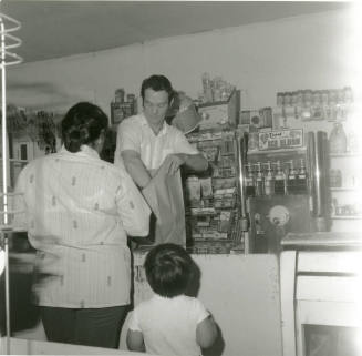 Mr. Don Wilcox working at the Sunrise Market, 937 S. Price Road - April 1978