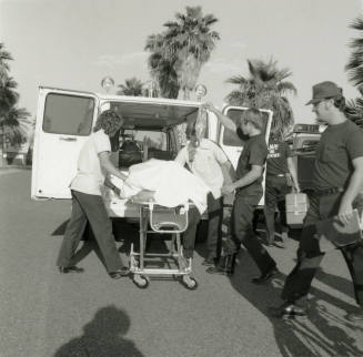 Putting Patient Into Ambulance