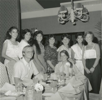 Unidentified Group of 8 Women, 1 Man in Restaurant