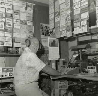 Man sitting at the radio. - August 1978