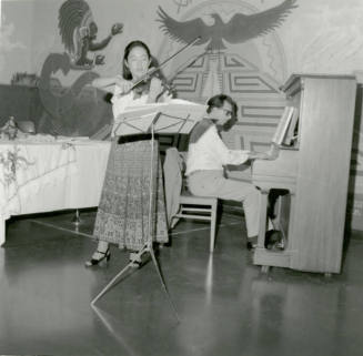 Woman Playing Violin and Man Playing Piano - September 1978