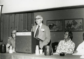 Howard Pyle Speaking at a "Rancho de los Caballeros" Podium