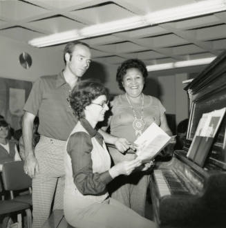 Unidentified Group of 3 at Piano