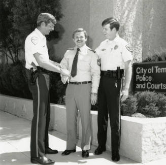 Unidentified Tempe Police Officers with Uniformed Man - August 6, 1984 - (1 of 2)