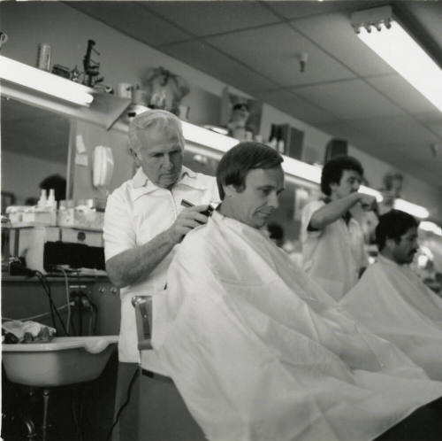 Mayor Mitchell gets haircut at Ray's Barber Shop