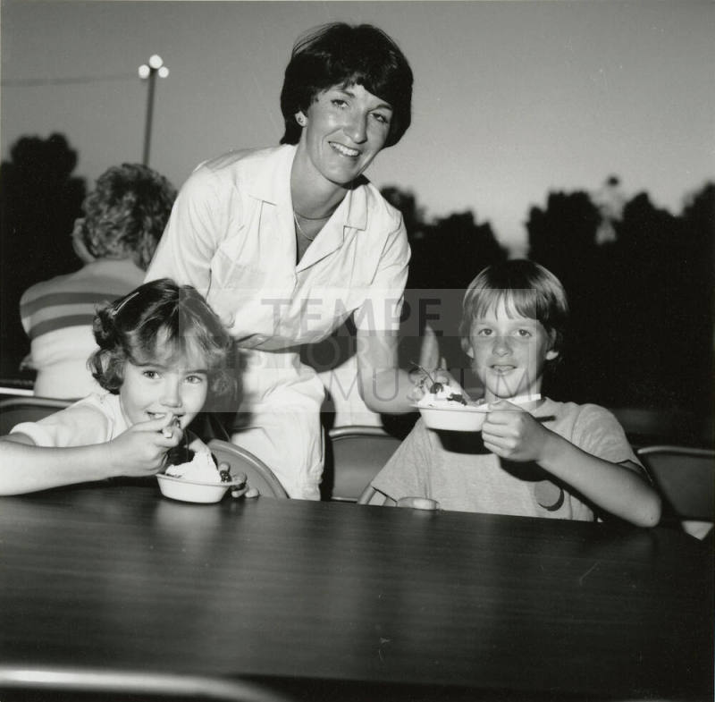 Unidentified Woman with 2 Ice-cream-Eating Children