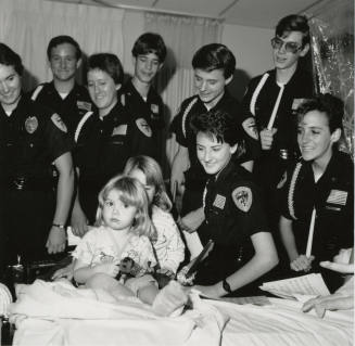 Tempe Police Dept. Explorers at St. Luke's Hospital- Tempe Daily News, December 28 1985