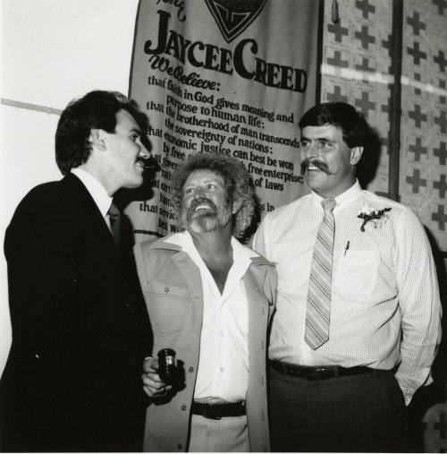 Unidentified Group of 3 Men Stand by Jaycee Creed Banner