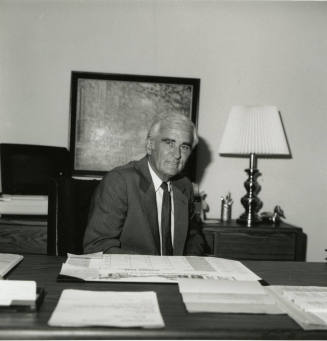 Unidentified man at a desk