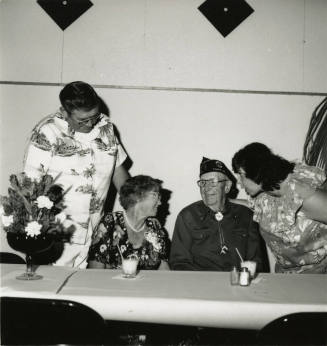Four unidentified people at a table