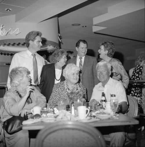 Duck's location opens at Holiday Inn at Rural and Apache. L to R- Peter Gorski, Pat and Roger Hatton, Juanita Harleson, Avery Helm, Virginia Tinsley and Jim Harleson