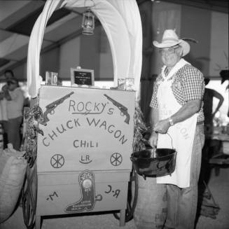 Arizona State Chili Cook-off. Lester Rockafellow with Rocky's Chuck Wagon and Cauldron