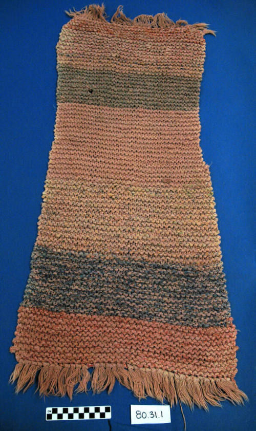 Pink knitted throw rug