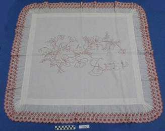 Red embroidered pillow sham