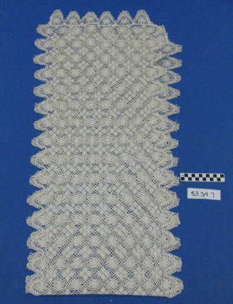 White crocheted pillow sham