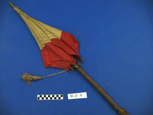 Red and tan silk parasol