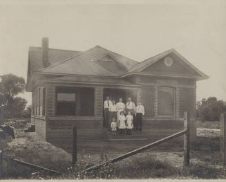 Moeur Family in front of home at NW Corner of Ninth Street and Ash, Tempe, Arizona
