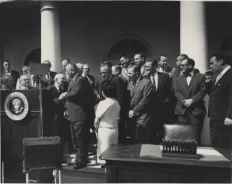 Senator Hayden shaking hands with President Johnson on the White House Porch