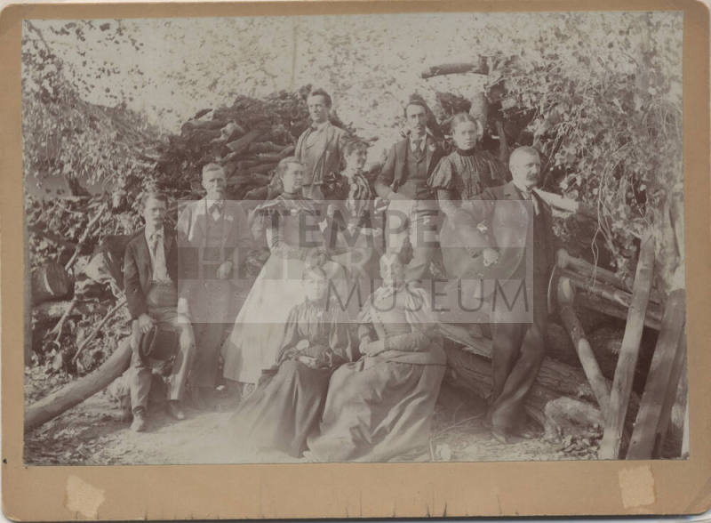 Johnson Family Photo infront of "Grandma Broomell's Wood Pile"