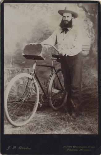 Dr. Fenn Hart with a Bicycle