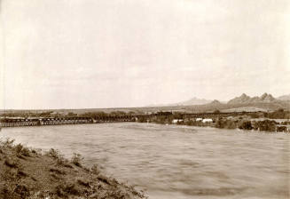 Flood Stage picture of the Salt River with the  Phoenix & Eastern Railroad Bridge (aka Santa Fe Bridge) and another bridge in the background