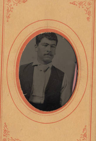 Young man in loose vest