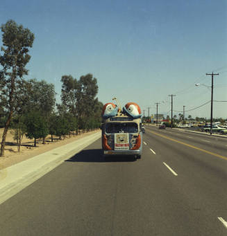 Bugline bus on road