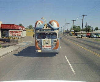 Bugline bus on road