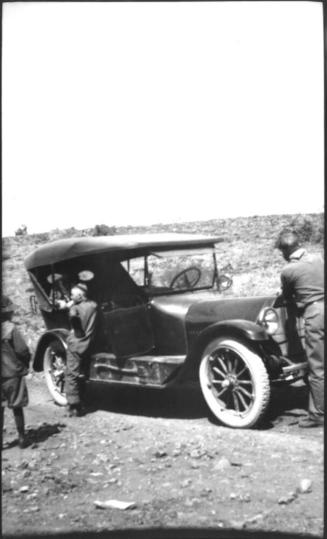 Ruby, Charles Custis and Charles Harold in car in desert