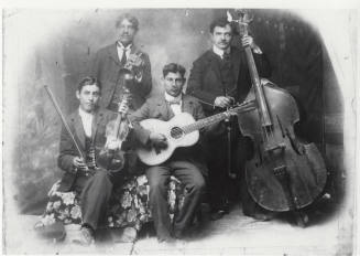 Photo - Mexican Quartet band: Pablo M. Chavarria seated, Mocho Alifonso standing, Francisco M. Chavarria seated, Elavterio Ballesteros standing