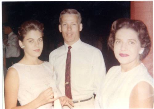 Photograph of Robert Royse, girlfriend Sue Herganrather, and Sally Hergenrather after Gradution