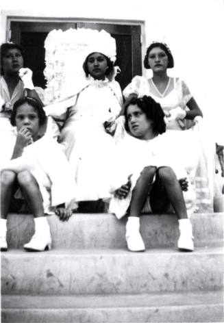 Girls and young women on steps for Fiestas Patrias celebration