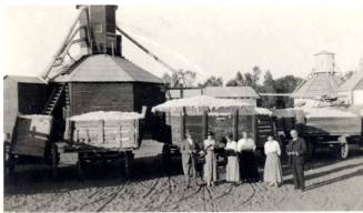 Photograph - Group in front of Cotton Gin