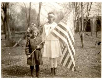 Minnie Laird with Little Girl Who's Holding a Flag
