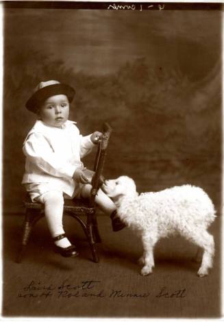 Photo of Laird Scott Baby with Lamb