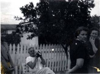 Forrest, Minnie, and Ann in California in front of a house