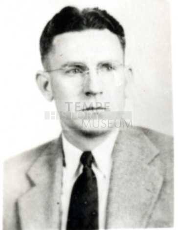 Portrait of Frank Raymond wearing glasses