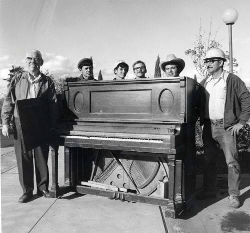Photograph - Ed Curry's Old Piano being moved to Museum
