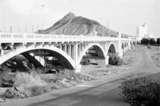 Looking southeast at Mill Avenue Bridge, Tempe Butte, and Hayden Flour Mill