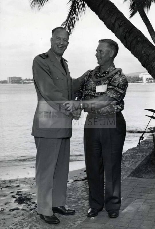 Picture of Clyde B. Smith being presented with a Lei
