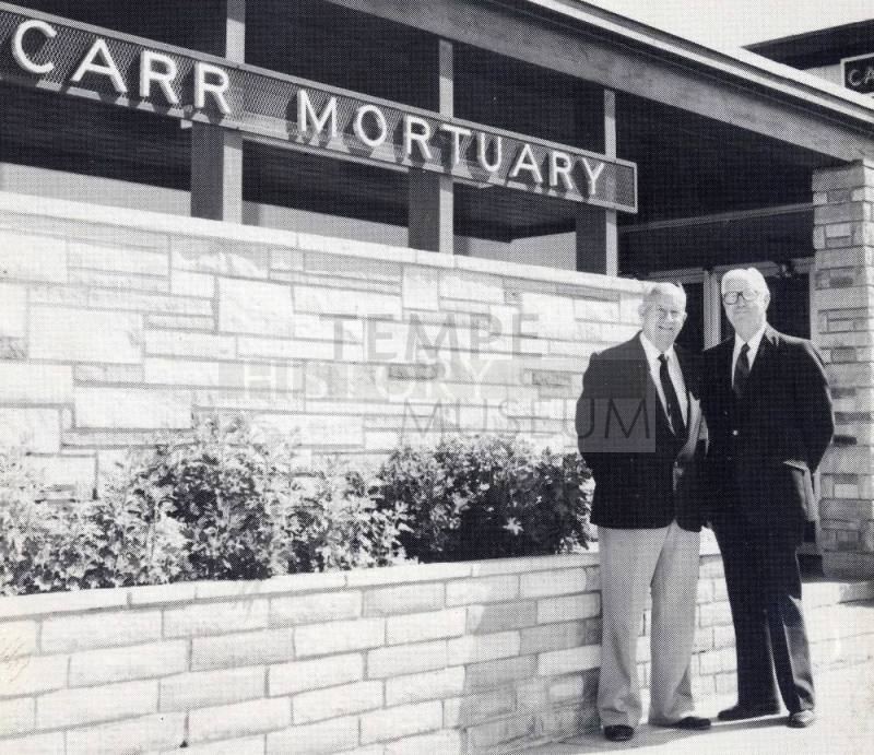 Photo of the Carr Brothers at the Carr Mortuary Entrance