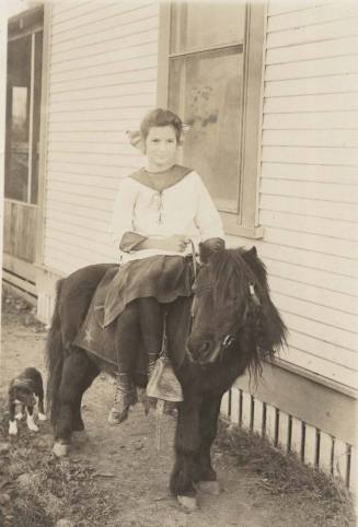 Marcia Elsie Austin on A Pony at 1035 Normal Ave.