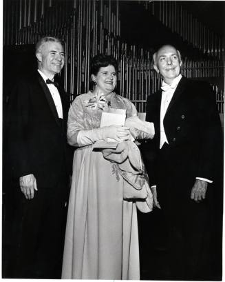 Dr. G. Homer Durham with Couple in Formal Wear