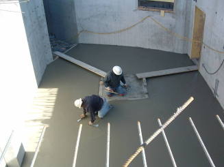 Tempe Center for the Arts construction photograph-Workers Smoothing Concrete