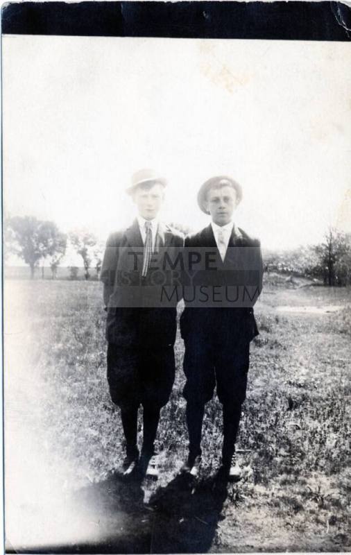 Postcard of two young men in knickers and hats