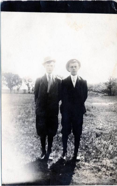 Postcard of two young men in knickers and hats