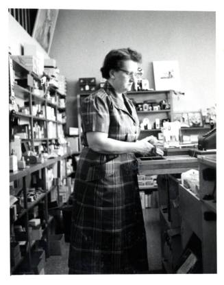 Pioneer Camera - Dorothy Wood behind store counter